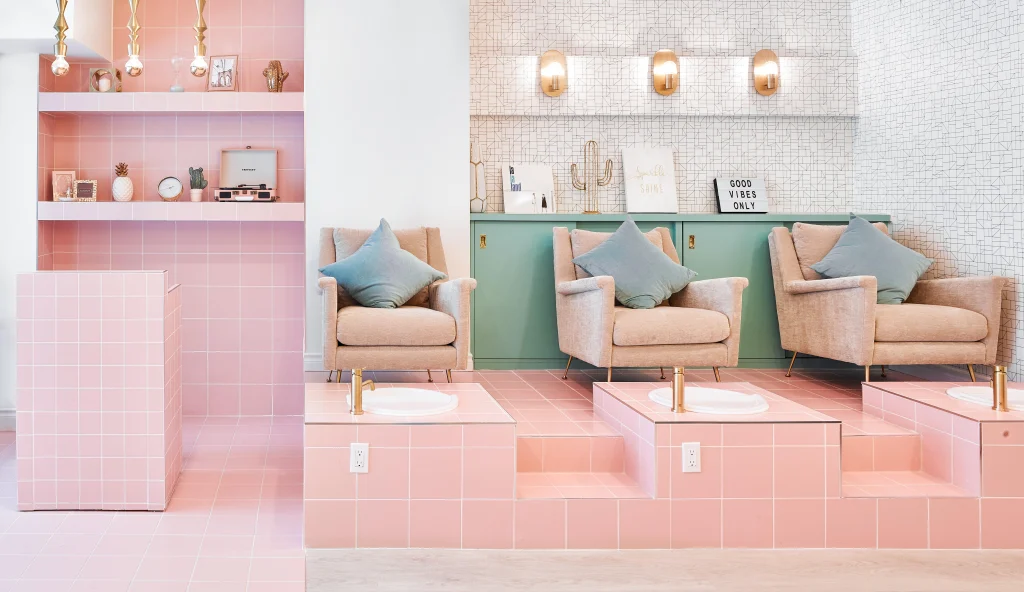 Interior Design - Interior space featuring pink tiled flooring and green accents with seating areas. Dexign Matter Studio