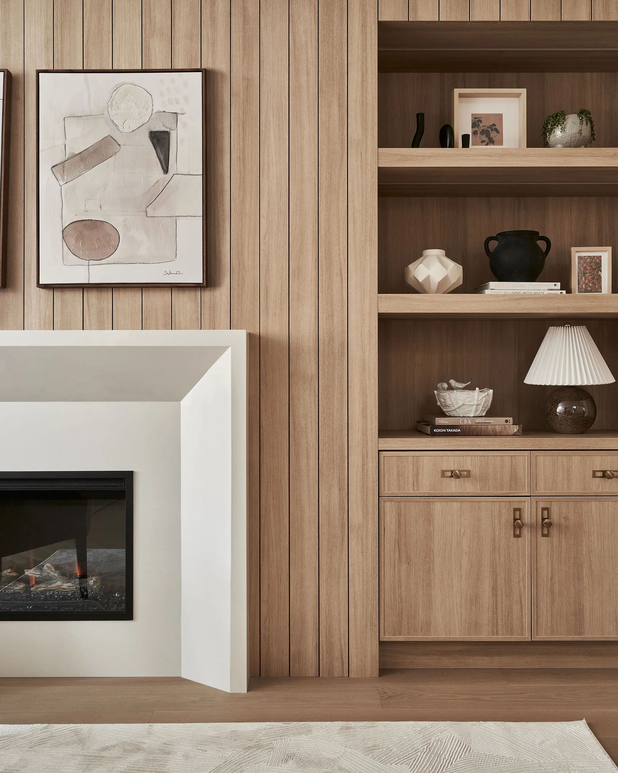 Interior Design - Interior design featuring wooden paneling, shelves, and a modern fireplace. Dexign Matter Studio