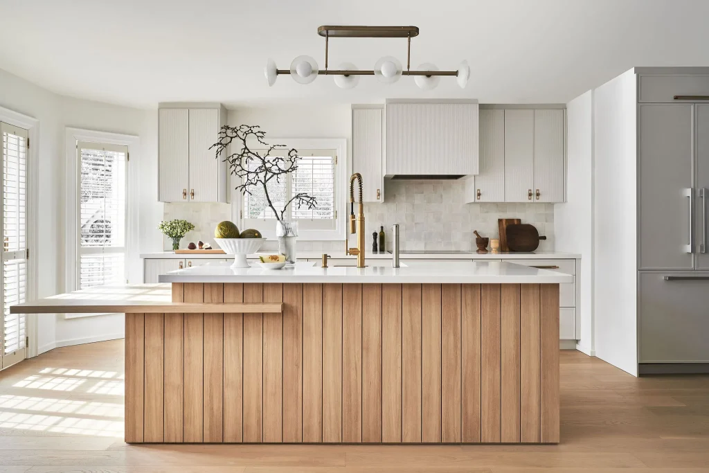 Interior Design - Contemporary kitchen featuring a wooden island and modern fixtures. Dexign Matter Studio