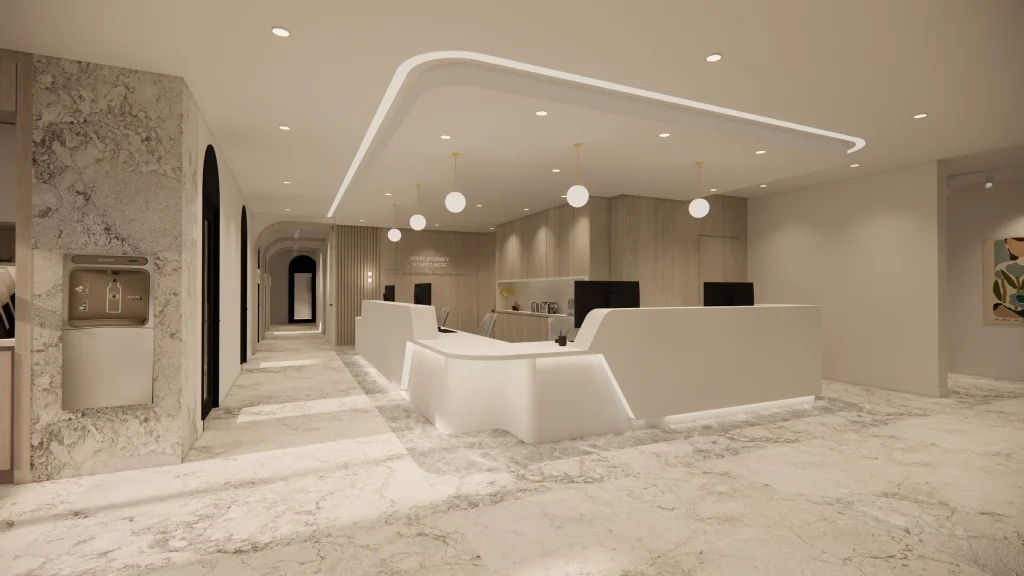 Interior Design - Interior view of a modern reception area with a curved front desk and pendant lighting. Dexign Matter Studio